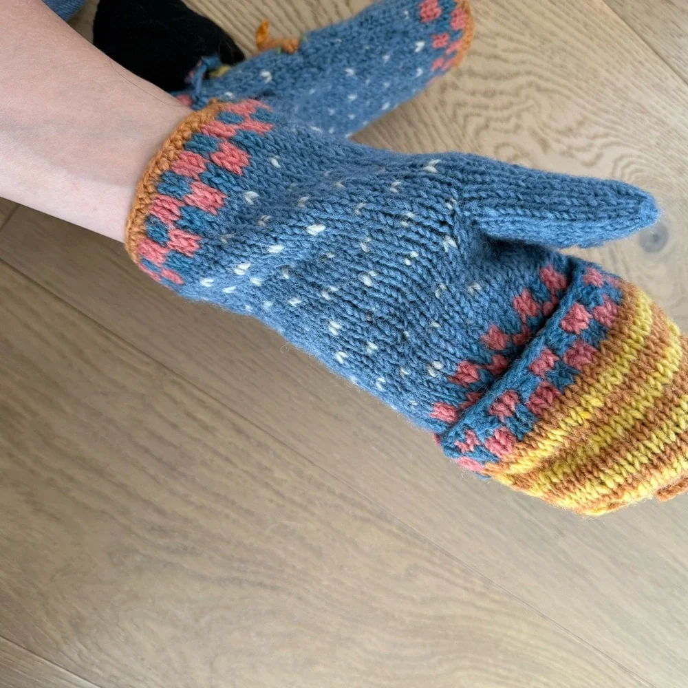 Whimsical Blue and Yellow Mittens with Playful Design